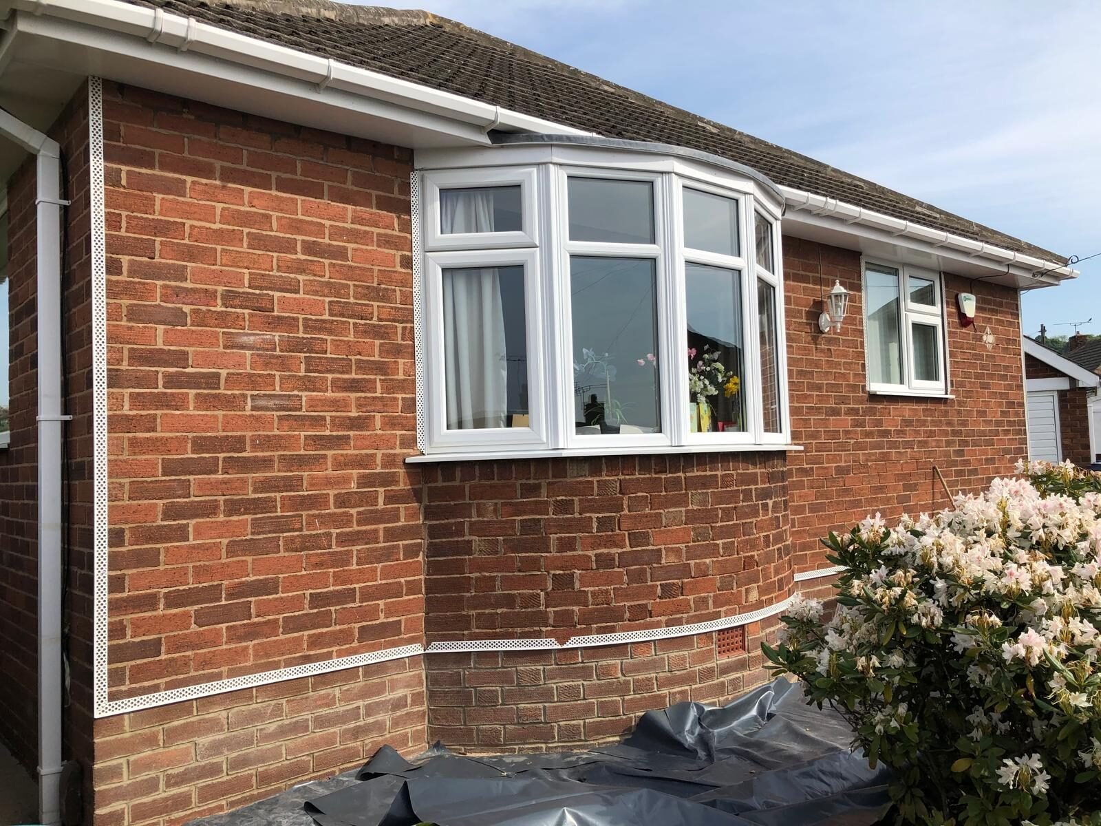 Grey silicone rendered bungalow frontage